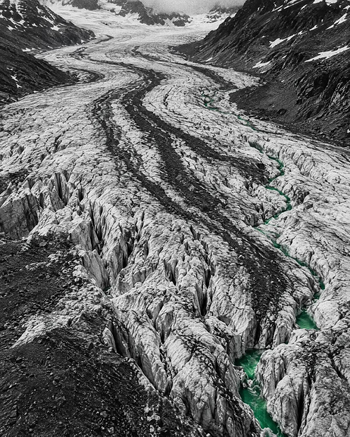 Glacier with a green meltwater channel